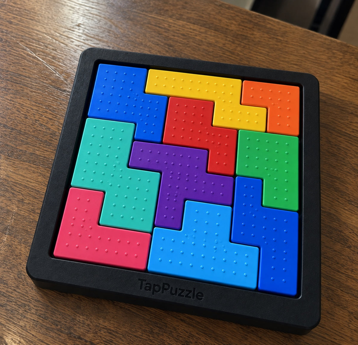 TapPuzzle colored pieces and textured frame